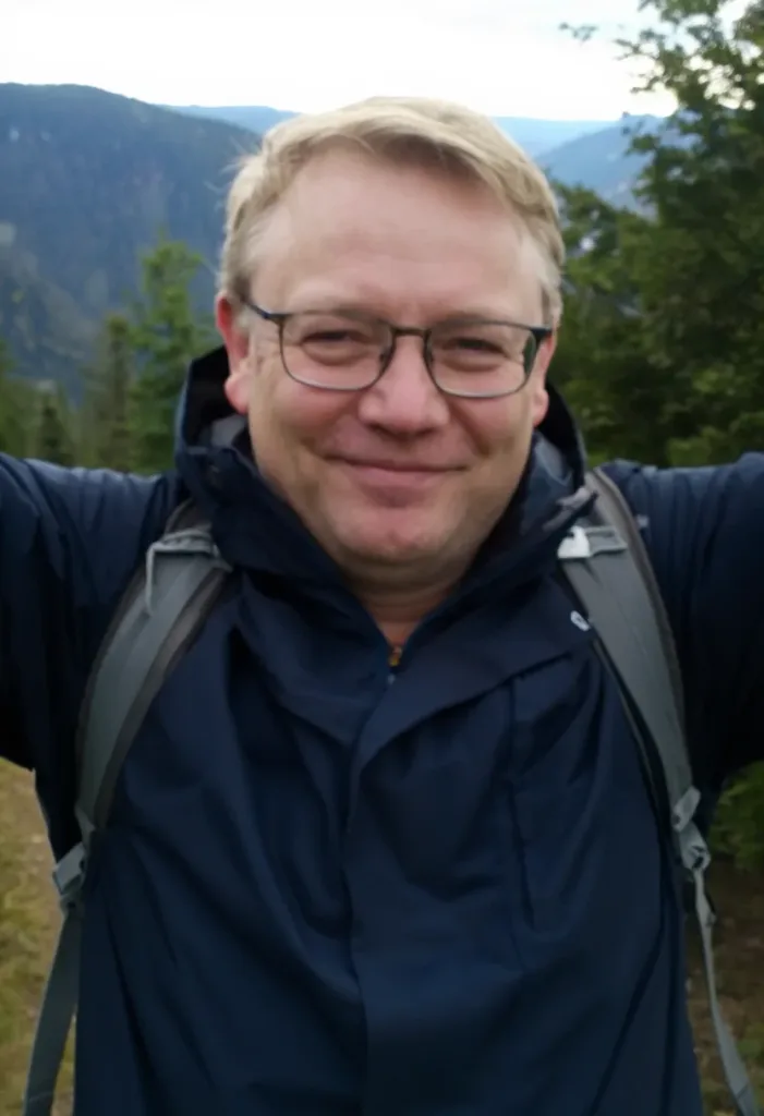 Николай
